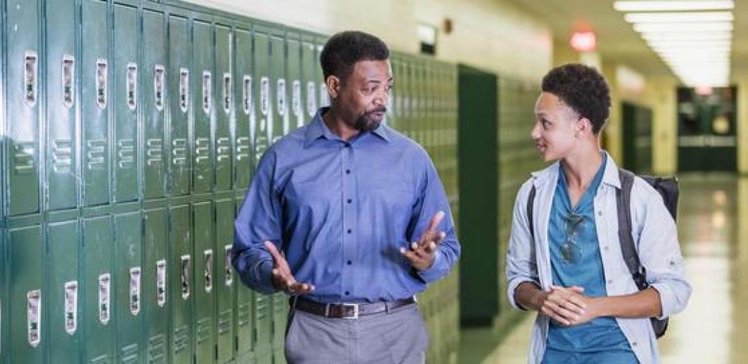 High School Counselors Professor and students talking